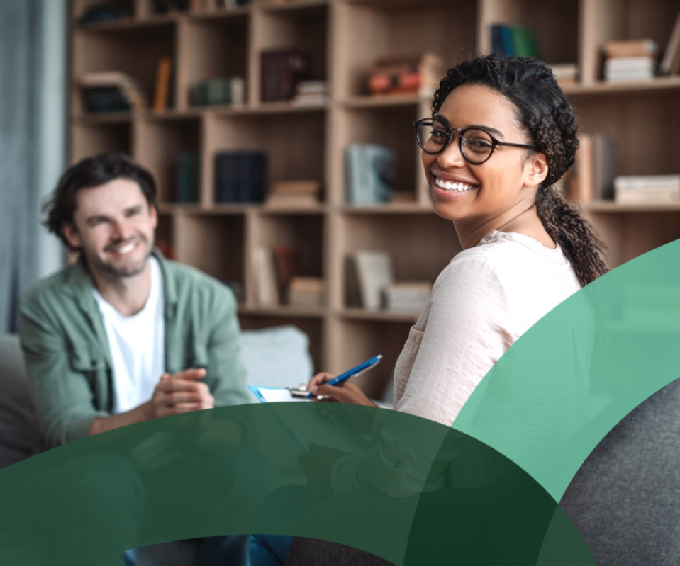 Smiling individuals engage in a supportive Employee Assistance Program session.